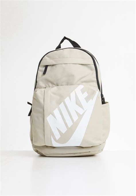 beige nike backpack